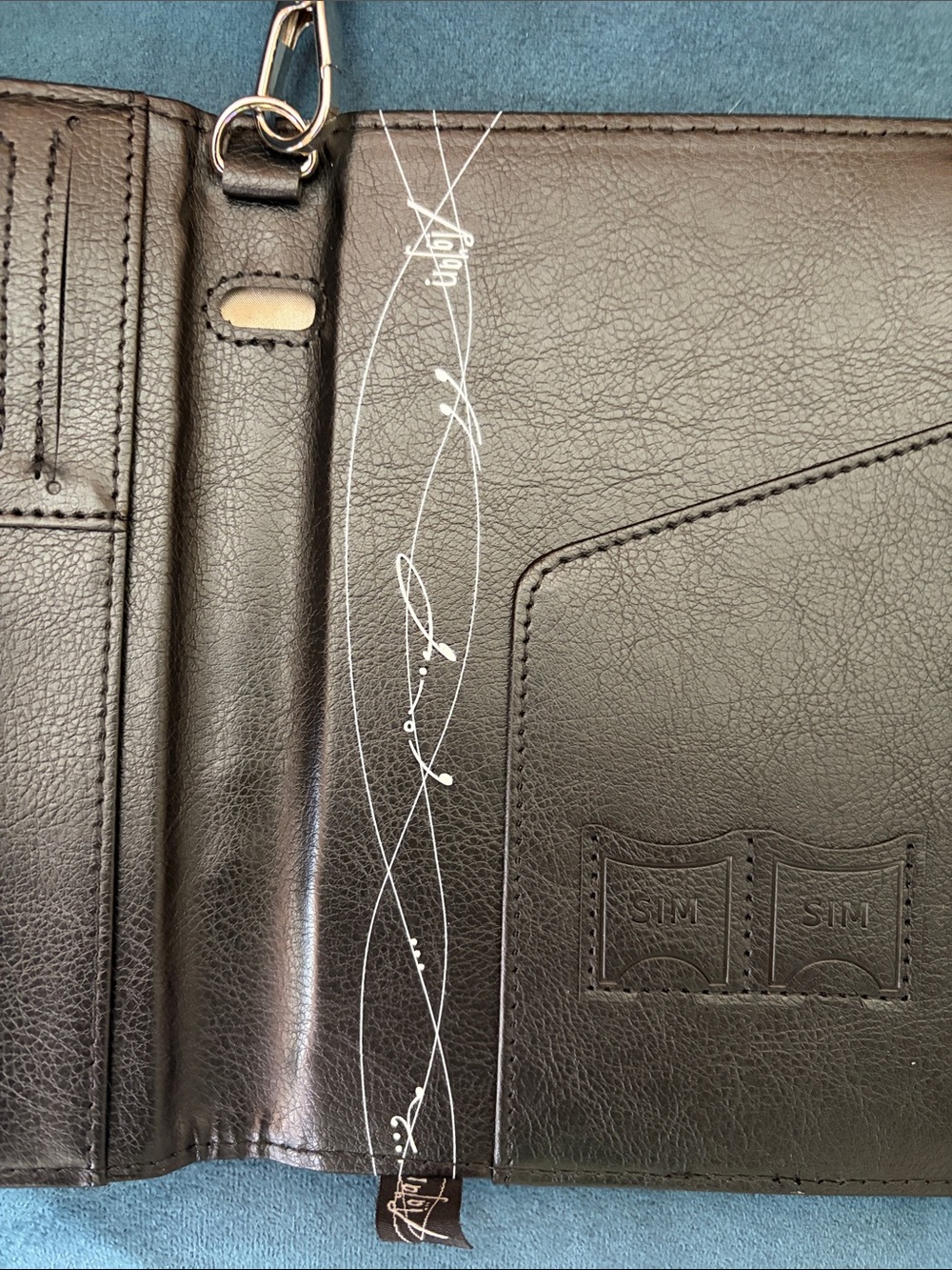 TNT RAyan Black Embossed Leather Passport Wallet with Signature Logo - Picture 7 of 10